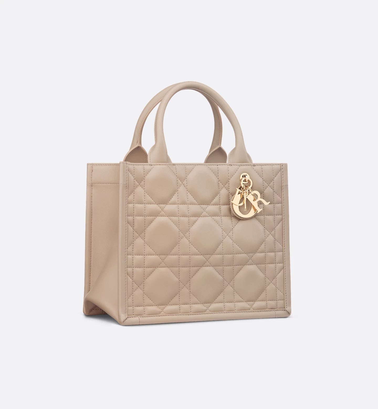 Dior Book Tote pequeño
Piel de becerro Macrocannage gris pardo desierto